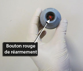 Bouton rouge de réarmement
